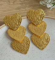 Aretes corazones cascada cebra