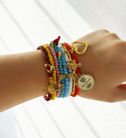 Set de 8 pulseras Macarena