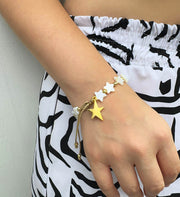 Pulsera en nacar con estrella en bronce