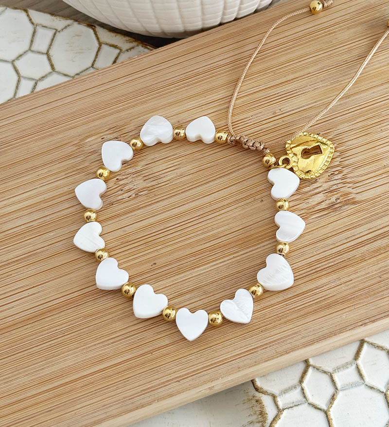 Pulsera en nacar con corazón en bronce