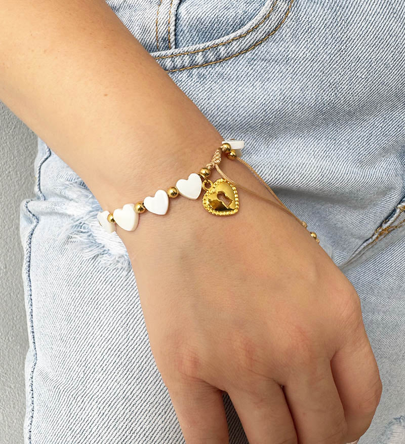 Pulsera en nacar con corazón en bronce