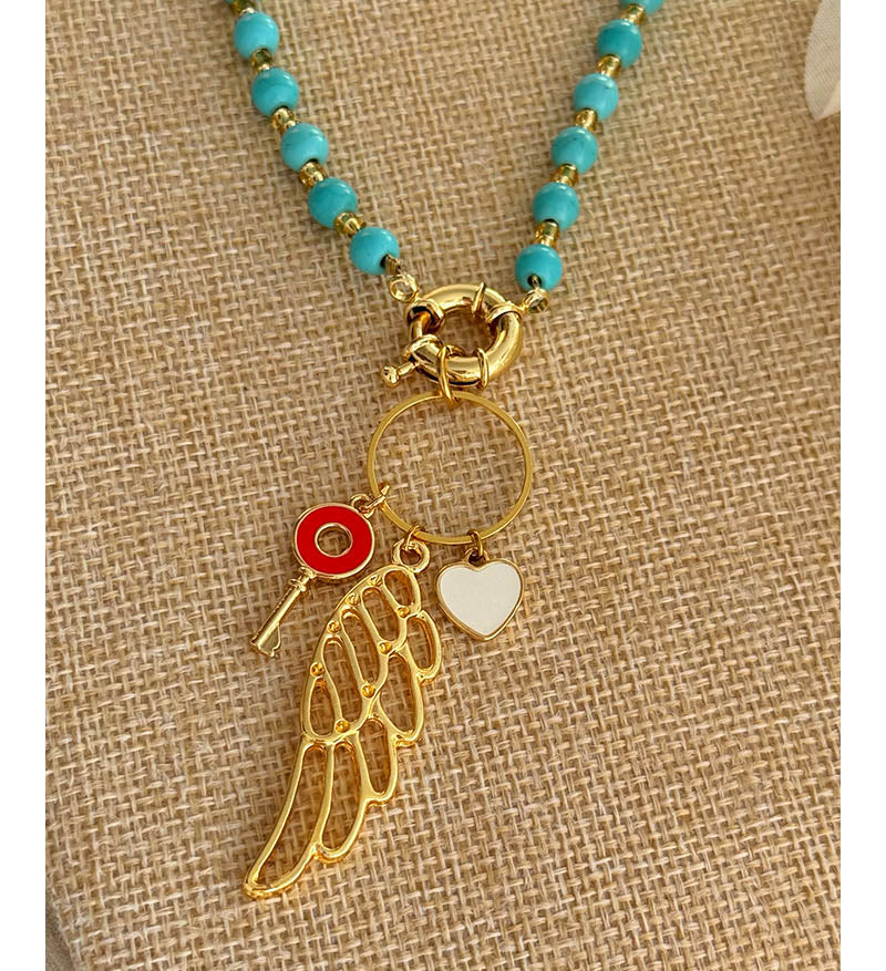 Collar turquesas y ala