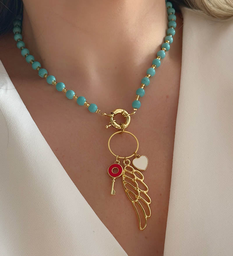 Collar turquesas y ala