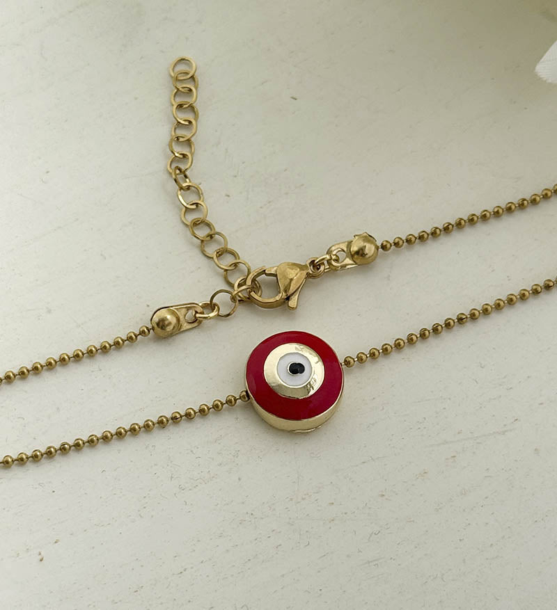 Tobillera dorada con ojo turco