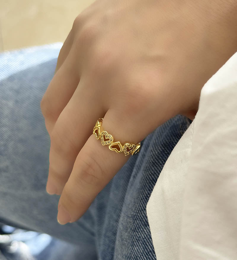 Anillo corazones silueta