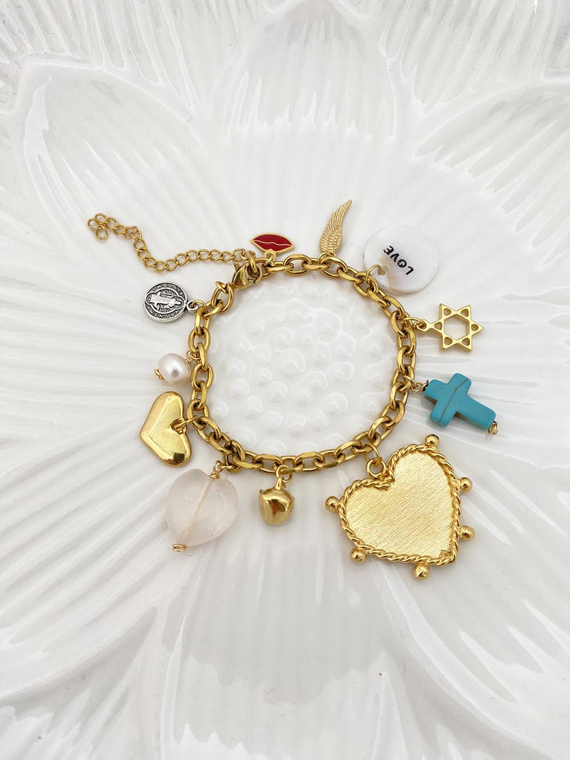 Pulsera en acero dorado con dije de corazón