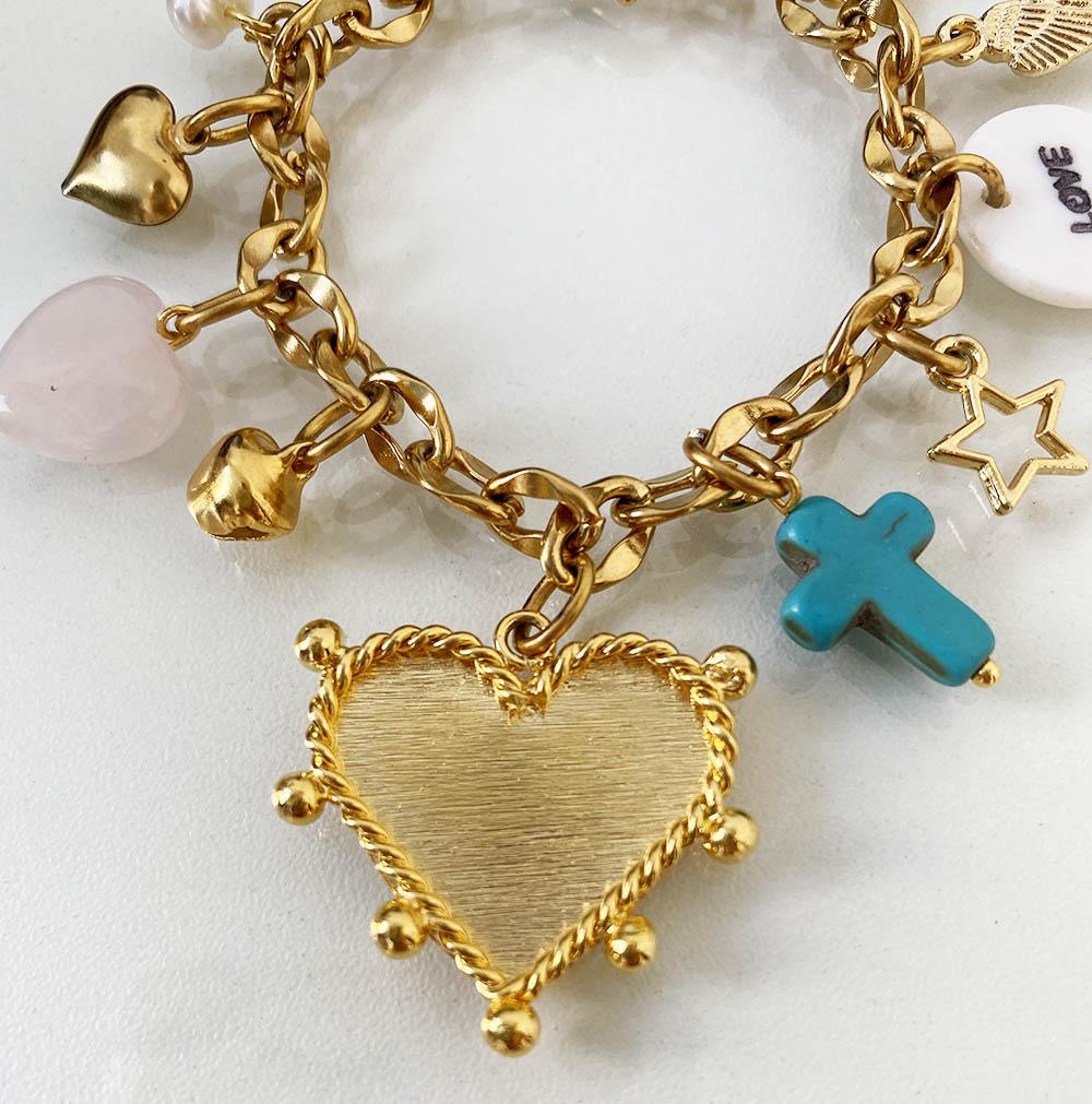 Pulsera en acero dorado con dije de corazón