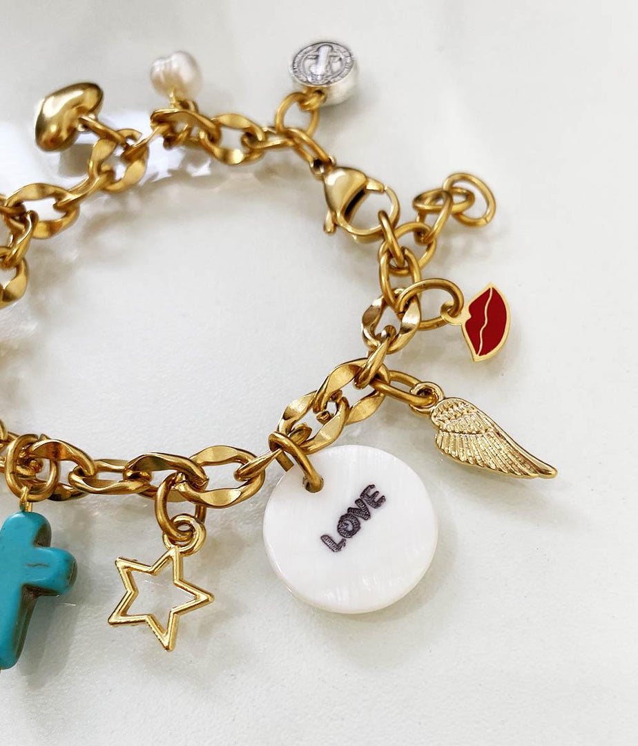 Pulsera en acero dorado con dije de corazón