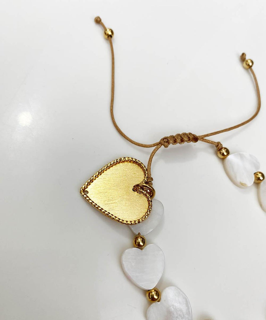 Pulsera en nacar con corazón en bronce